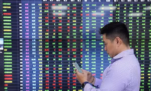 Vì sao ngân hàng muốn ‘thâu tóm’ công ty chứng khoán?