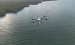 Lần đầu tiên triển khai UAV giao hàng vượt biển ở TPHCM