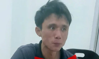 Lê Văn Tuấn tại cơ quan công an.