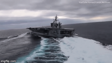 Tàu sân bay USS Lincoln dài 300m trổ tài cua gấp tốc độ cao