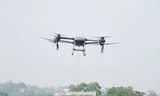 Bay drone vận chuyển hàng tấn hàng hỗ trợ người dân vùng lũ bị cô lập ở Bắc Ninh. Ảnh: Nguyễn Thắng