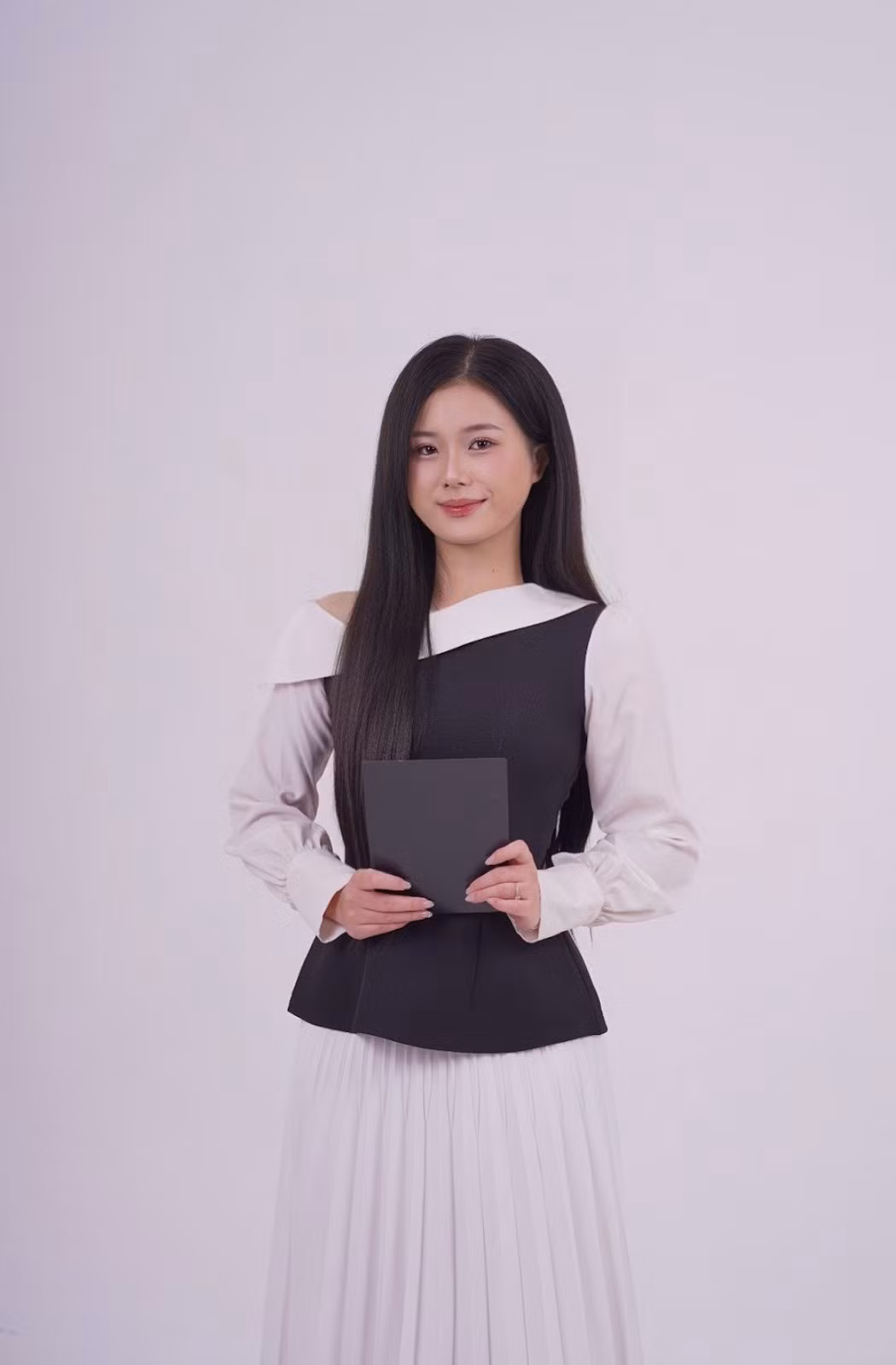Nguyễn Thị Mỹ Tâm Sinh - viên năm tư ngành Báo chí, Trường Đại học Khoa học Xã hội và Nhân văn, Đại học Quốc gia Hà Nội.