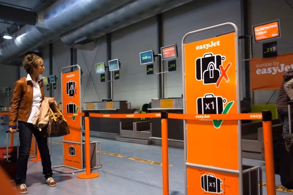 passenger-arrives-check-in-area-906001075-11zon.jpg
