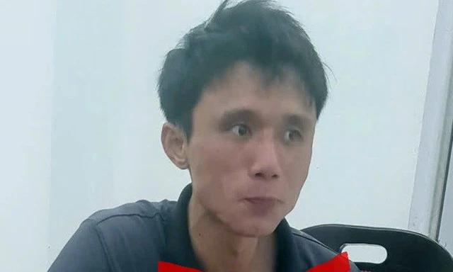 Lê Văn Tuấn tại cơ quan công an.