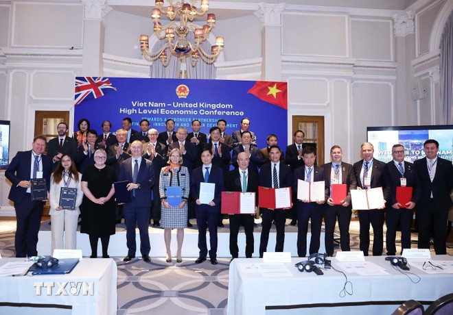 Tổng Bí thư Tô Lâm chứng kiến Lễ trao thỏa thuận hợp tác giữa doanh nghiệp hai nước. (Ảnh: Thống Nhất/TTXVN)