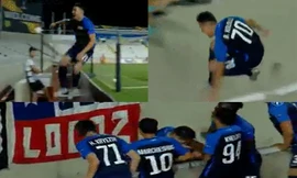 Benjamin Kololli ngã xuống đường hầm khi ăn mừng bàn thắng.