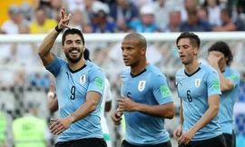 Uruguay chính thức giành vé dự vòng 1/8. Ảnh: Getty.