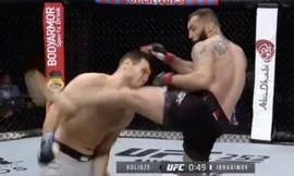 Roman Dolidze ra đòn hạ gục đối thủ.