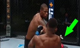 Kevin Holland ra đòn khiến đối thủ văng đệm răng.