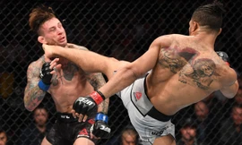 Kevin Lee tung cước chính xác vào đầu Gregor Gillespie.