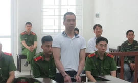 Nguyễn Trọng Nam - kẻ chém cả vợ và con mình.