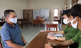 Nguyễn Quốc Toàn tại thời điểm bị công an bắt theo lệnh truy nã.