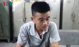 Hùng tại cơ quan công an