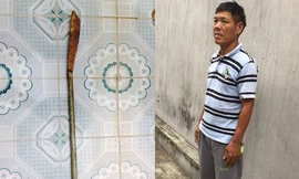 Bị can Năm và tang vật tại cơ quan công an