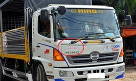 Xe "vua" nhởn nhơ trên đường nhưng không bị xử lý. Ảnh: Người lao động