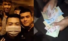 Nhóm thanh niên chặn đường xin đểu xe trên cao tốc (Ảnh: Cắt từ clip)