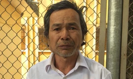 Đối tượng Dương Minh Sơn tại cơ quan công an