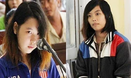 Bị cáo Phan Thị Kim Xuyến (trái) và hung thủ Lê Thị Mỹ Duyên tại phiên tòa sơ thẩm