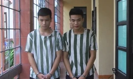 Hai nghi phạm tại cơ quan điều tra