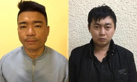 Giang (trái) và Toại tại cơ quan điều tra