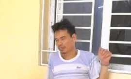 Đỗ Đình Tiến tại cơ quan công an