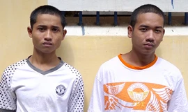 Phinh và Cuôi tại cơ quan công an.