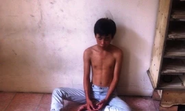 Trần Quang Tú tại cơ quan công an