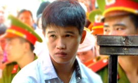 Vũ trong lúc chờ tòa tuyên án. Ảnh: Xuân Mai