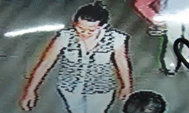 Người phụ nữ tình nghi bắt cóc cháu bé (Ảnh từ camera ở bệnh viện)