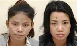 Hai chị em Niệm tại cơ quan công an