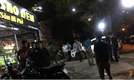 Lực lượng chức năng tới điều tra tại hiện trường vụ nổ súng, gây thương tích. Ảnh: Người Lao Động