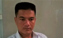 Tài xế Phạm Thành Hiếu tại cơ quan điều tra. Ảnh: Công an cung cấp