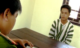 Hoàng Tài- đối tượng chủ mưu bị bắt giữ tại cơ quan công an