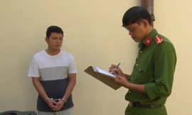 Nguyễn Thanh Vĩ tại cơ quan công an