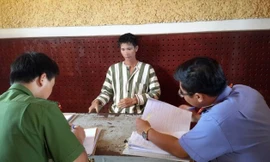 Đối tượng Nông Văn Vinh tại cơ quan công an