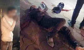 Nam thanh niên bị chém gục tại chỗ và người bạn đi cùng (áo trắng) may mắn thoát nạn