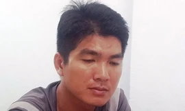 Trần Minh Phông ở cơ quan công an