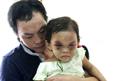 Bé Ngân trong vòng tay của cha ruột