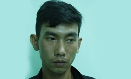 Lê Văn Công tại cơ quan công an