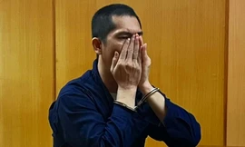 Nguyễn Ngọc Luyện tại phiên tòa.