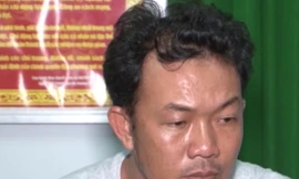 Lê Tấn Tú tại cơ quan công an