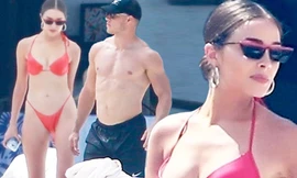 Hoa hậu Olivia Culpo khoe body 'cực phẩm' với bikini bé xíu bên trai lạ