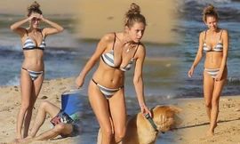 Siêu mẫu 9x Dylan Penn mặc áo tắm gợi cảm, dắt chó dạo biển