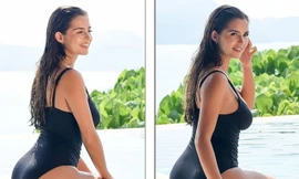 'Kim siêu vòng ba' nước Anh phô dáng nảy lửa bên bể bơi