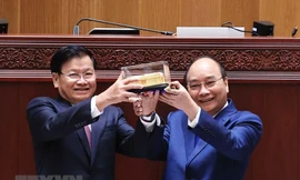 Hình ảnh Chủ tịch nước dự Lễ bàn giao Tòa Nhà Quốc hội mới cho Lào 