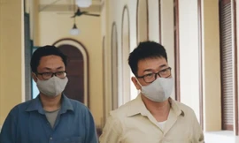 Cựu Phó Chánh án TAND quận 4 Nguyễn Hải Nam bà cựu Giảng viên Lâm Hoàng Tùng tại phiên xử sơ thẩm. Ảnh: Tân Châu