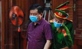 Ông Đinh La Thăng tại phiên tòa sơ thẩm. Ảnh: Tân Châu