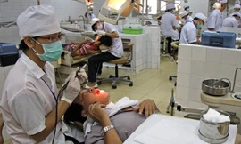 Nhổ 4 chiếc răng khôn có sao không?