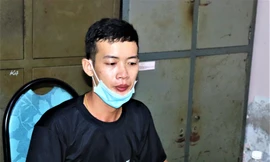 Nghi phạm Lý Văn Phương tại cơ quan công an