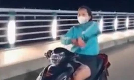 Bản tin 8H: ‘Nữ quái’ phóng xe tốc độ cao, múa quạt trên cầu